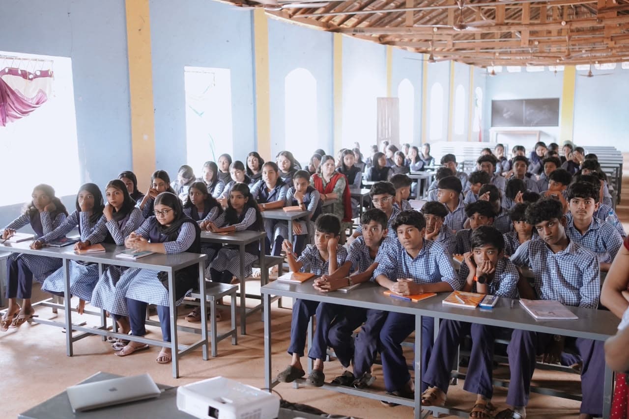 Students attending a Hello 2 AI classroom session at Sabari PTB Smaraka Higher Secondary School, Adakkaputhur